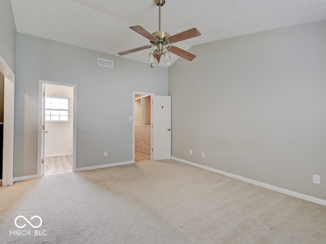 3902 Jekyll Ct, Indianapolis, IN 46237 - unfurnished bedroom with light carpet, ensuite bath, high vaulted ceiling, and a ceiling fan