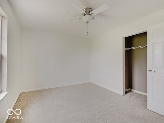 3902 Jekyll Ct, Indianapolis, IN 46237 - unfurnished bedroom with carpet flooring, a closet, and a ceiling fan