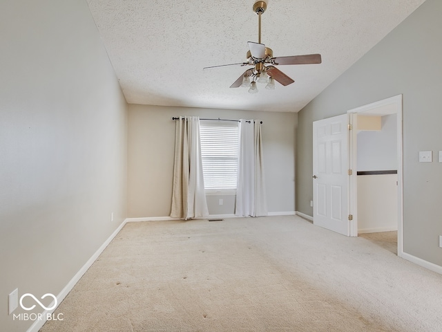 3902 Jekyll Ct, Indianapolis, IN 46237 - carpeted spare room with a textured ceiling, ceiling fan, and lofted ceiling