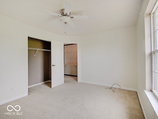 3902 Jekyll Ct, Indianapolis, IN 46237 - unfurnished bedroom featuring light colored carpet, multiple windows, and a closet