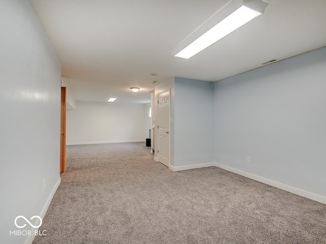 3902 Jekyll Ct, Indianapolis, IN 46237 - finished basement featuring carpet flooring and baseboards