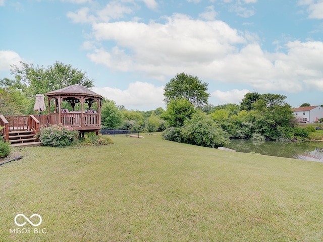 3902 Jekyll Ct, Indianapolis, IN 46237 - view of green lawn with a gazebo and a deck with water view