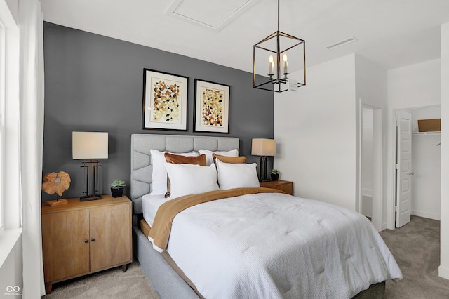 924 Shadow Dr, Danville, IN 46122 - bedroom with light carpet and a chandelier