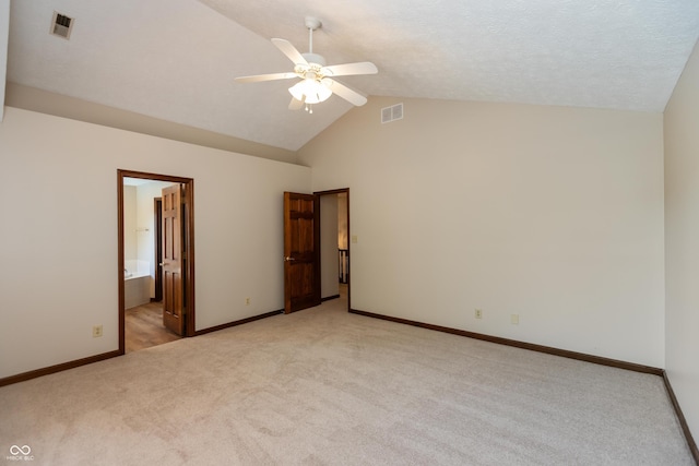 6926 Princess Ln, Avon, IN 46123 - unfurnished bedroom with light colored carpet, high vaulted ceiling, ceiling fan, and ensuite bathroom
