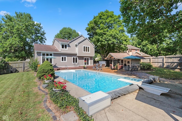 6926 Princess Ln, Avon, IN 46123 - view of pool featuring a diving board, a fenced backyard, and a patio