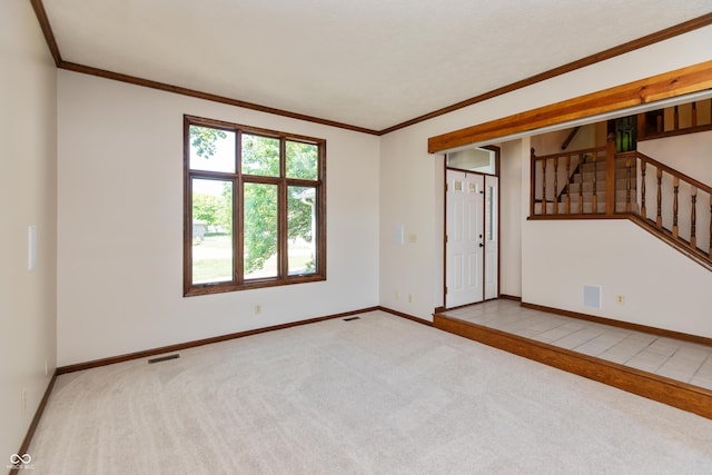 6926 Princess Ln, Avon, IN 46123 - spare room with carpet flooring, stairs, and crown molding