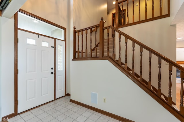 6926 Princess Ln, Avon, IN 46123 - entrance foyer with light tile patterned floors and stairway