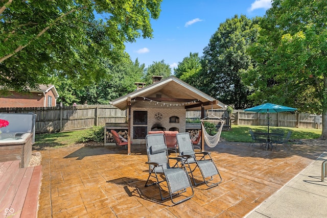 6926 Princess Ln, Avon, IN 46123 - fenced backyard with an outdoor brick fireplace, a patio area, outdoor dining area, and a gazebo
