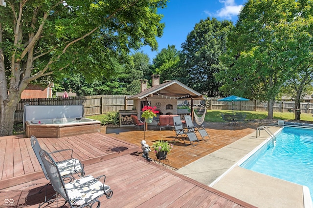 6926 Princess Ln, Avon, IN 46123 - view of pool featuring a fenced backyard, a wooden deck, view of wooded area, and grilling area