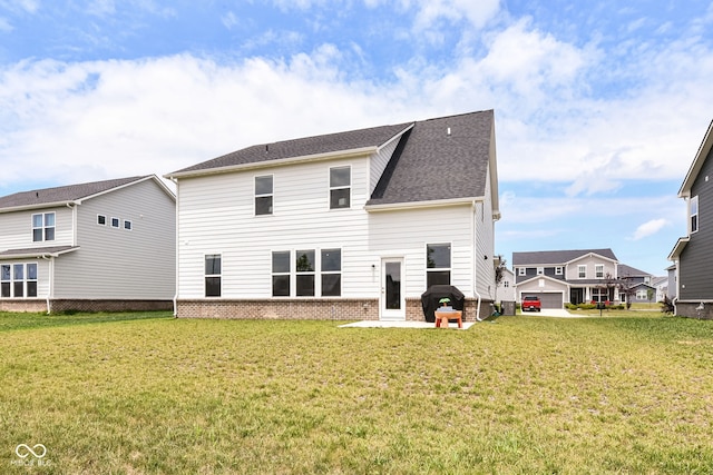 7101 Oak Trace Ln, Brownsburg, IN 46112 - back of property featuring brick siding, a lawn, and a residential view