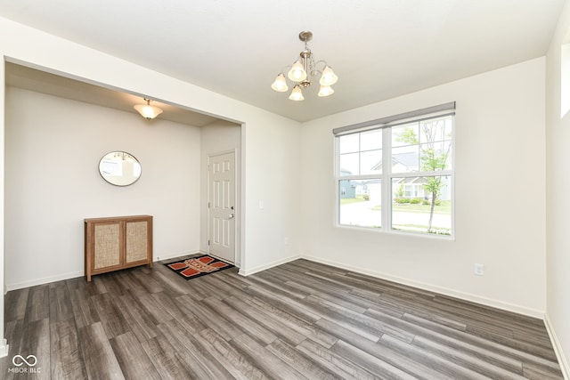 7101 Oak Trace Ln, Brownsburg, IN 46112 - entryway with dark wood finished floors and a chandelier