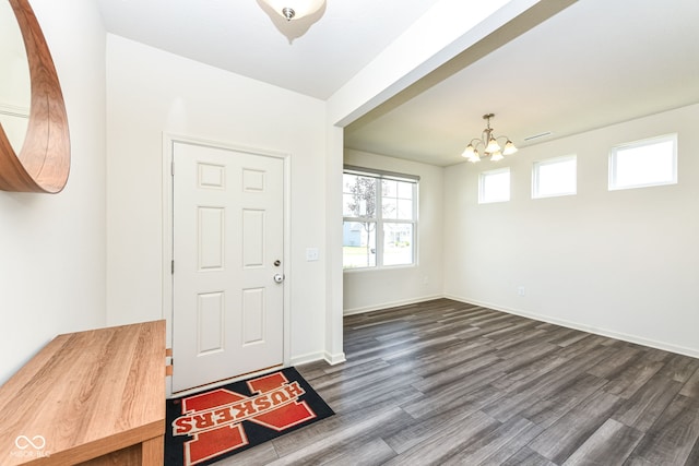 7101 Oak Trace Ln, Brownsburg, IN 46112 - foyer with a chandelier and dark wood-type flooring