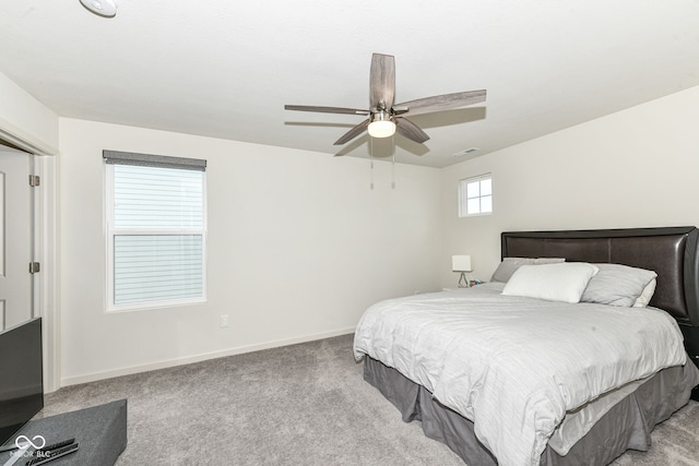 7101 Oak Trace Ln, Brownsburg, IN 46112 - bedroom featuring light carpet and a ceiling fan