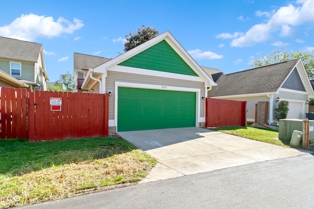 2454 N Talbott St, Indianapolis, IN 46205 - view of front of house with driveway and a garage