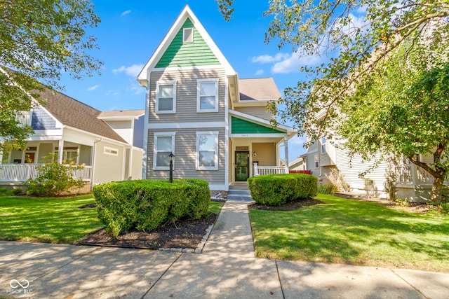 2454 N Talbott St, Indianapolis, IN 46205 - traditional-style house with a porch and a front yard