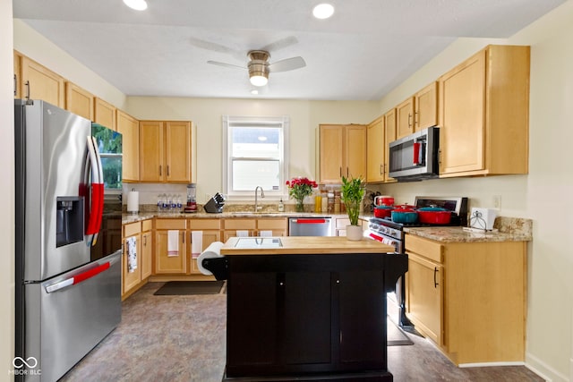 2454 N Talbott St, Indianapolis, IN 46205 - kitchen featuring appliances with stainless steel finishes, light brown cabinets, a ceiling fan, and recessed lighting