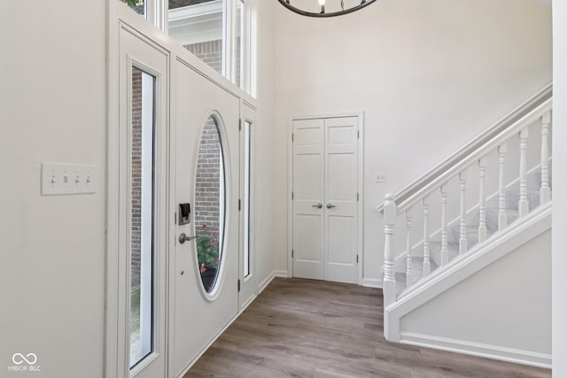 11845 Discovery Cir, Indianapolis, IN 46236 - entryway with stairs, wood finished floors, and a high ceiling