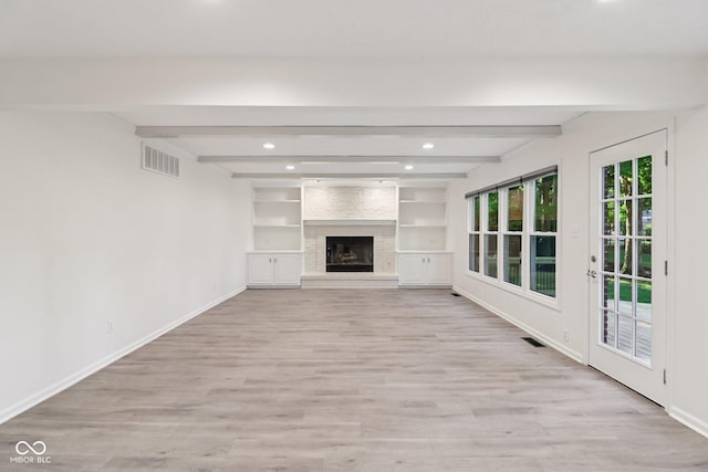 11845 Discovery Cir, Indianapolis, IN 46236 - unfurnished living room with recessed lighting, light wood-style flooring, beamed ceiling, and a fireplace