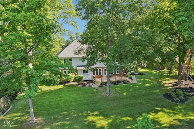 11845 Discovery Cir, Indianapolis, IN 46236 - view of grassy yard with a wooden deck