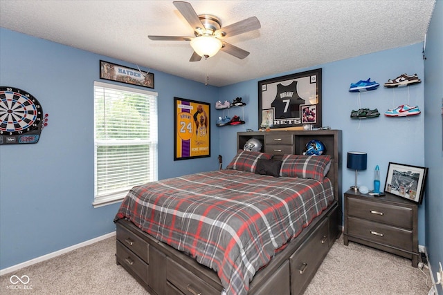 7950 Crackling Ln, Indianapolis, IN 46259 - bedroom with light carpet, a textured ceiling, and ceiling fan