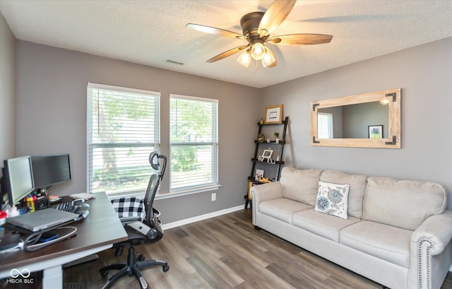 7950 Crackling Ln, Indianapolis, IN 46259 - home office featuring a ceiling fan, wood finished floors, and a textured ceiling