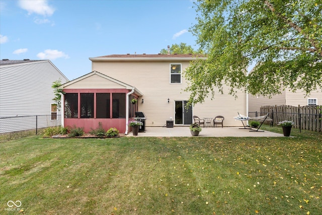 7950 Crackling Ln, Indianapolis, IN 46259 - rear view of house with a sunroom, a patio, and a fenced backyard
