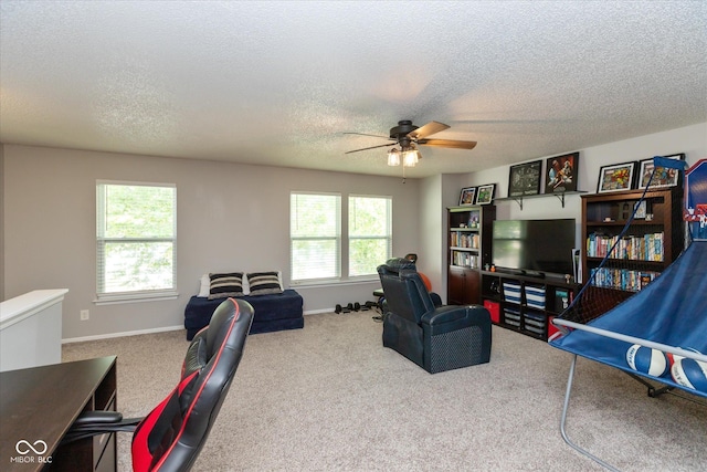 7950 Crackling Ln, Indianapolis, IN 46259 - carpeted living area with a ceiling fan and a textured ceiling