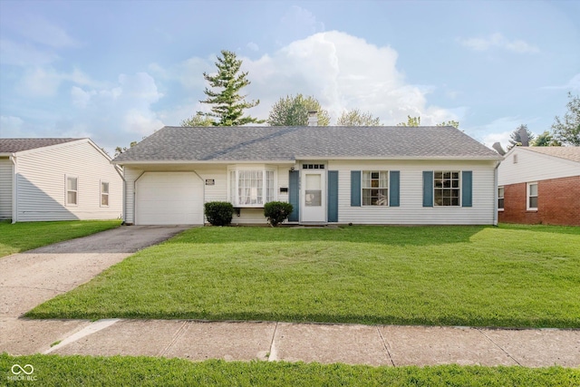 2466 Sickle Rd, Indianapolis, IN 46219 - ranch-style home with an attached garage, driveway, and a front yard