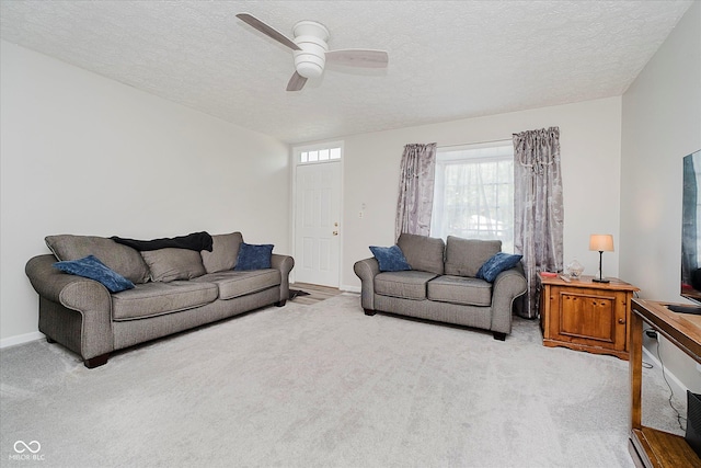2466 Sickle Rd, Indianapolis, IN 46219 - carpeted living room featuring ceiling fan and a textured ceiling