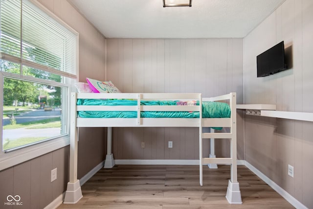 1743 Chandler Ln, Columbus, IN 47203 - unfurnished bedroom with wood finished floors