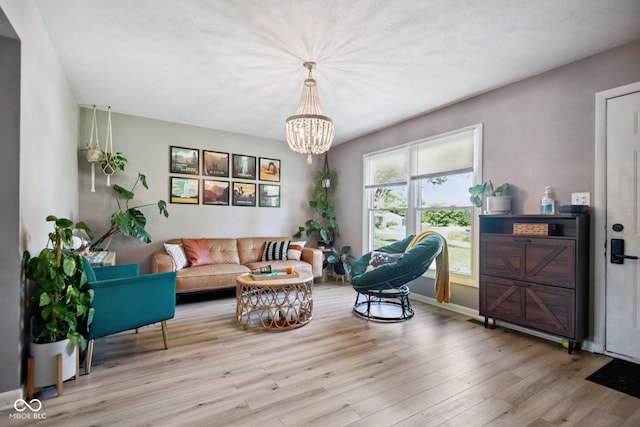 1743 Chandler Ln, Columbus, IN 47203 - living area with wood finished floors and a chandelier