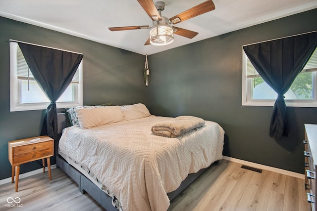 1743 Chandler Ln, Columbus, IN 47203 - bedroom with light wood-type flooring and a ceiling fan