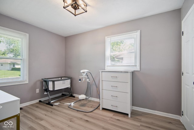 1743 Chandler Ln, Columbus, IN 47203 - miscellaneous room featuring healthy amount of natural light and light wood-type flooring