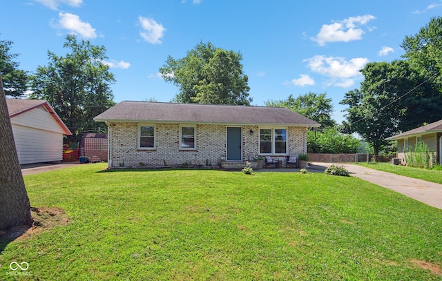 1743 Chandler Ln, Columbus, IN 47203 - ranch-style home featuring brick siding and concrete driveway