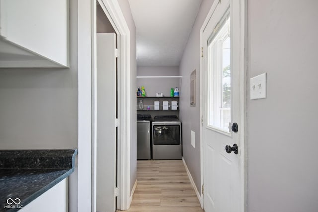 1743 Chandler Ln, Columbus, IN 47203 - laundry area featuring separate washer and dryer and light wood-type flooring