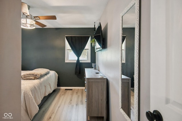 1743 Chandler Ln, Columbus, IN 47203 - bedroom featuring light wood-style flooring and ceiling fan