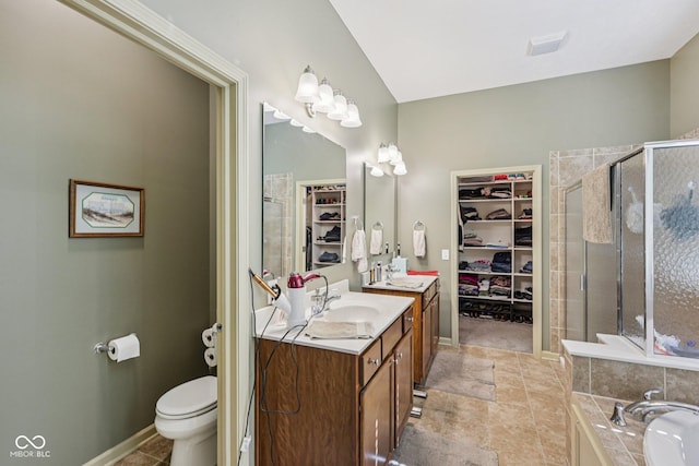 1387 Mayfield Ct, Westfield, IN 46074 - bathroom with a stall shower, vanity, a walk in closet, a bath, and tile patterned flooring