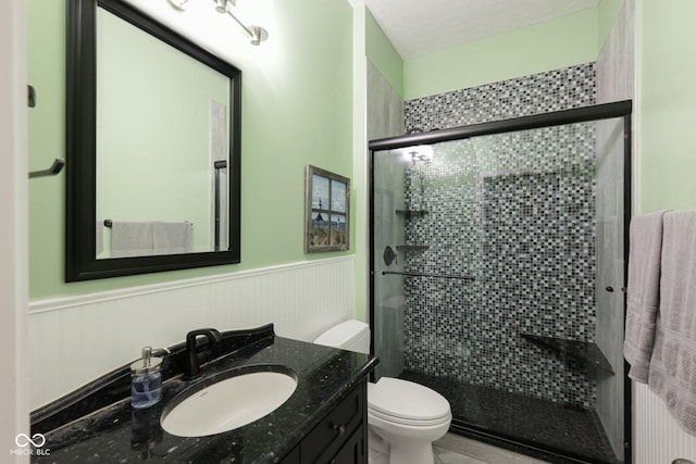 1387 Mayfield Ct, Westfield, IN 46074 - bathroom with a shower stall, vanity, and wainscoting