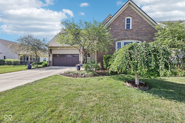 1387 Mayfield Ct, Westfield, IN 46074 - view of front of home with brick siding, concrete driveway, and a garage