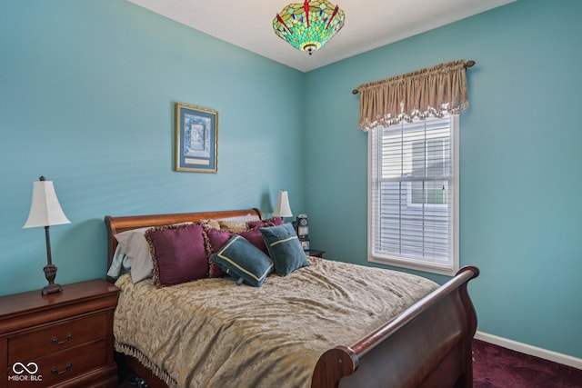 1387 Mayfield Ct, Westfield, IN 46074 - bedroom featuring dark colored carpet and baseboards