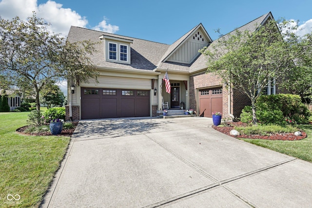 1387 Mayfield Ct, Westfield, IN 46074 - craftsman inspired home featuring brick siding, concrete driveway, a front yard, a garage, and board and batten siding