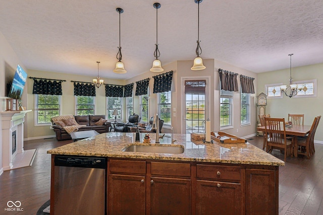 1387 Mayfield Ct, Westfield, IN 46074 - kitchen featuring a chandelier, dishwasher, dark wood-style floors, open floor plan, and a textured ceiling