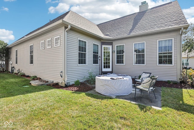 1387 Mayfield Ct, Westfield, IN 46074 - rear view of property with a patio, a yard, a chimney, and roof with shingles