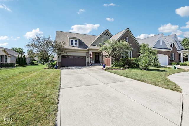 1387 Mayfield Ct, Westfield, IN 46074 - view of front of property featuring driveway, a front lawn, and roof with shingles