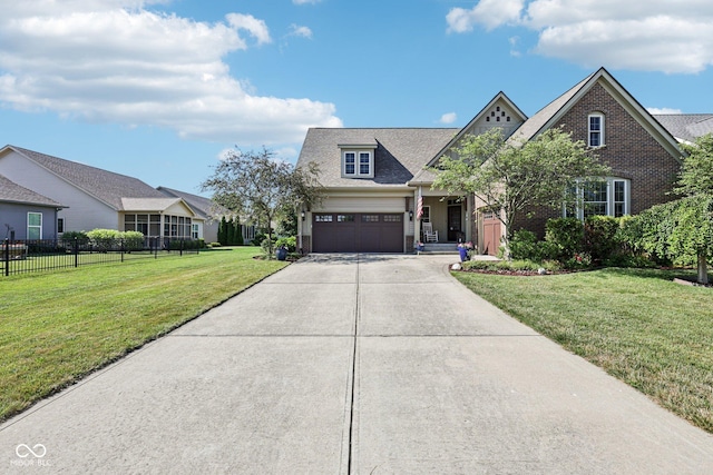 1387 Mayfield Ct, Westfield, IN 46074 - view of front of house with driveway, brick siding, and a shingled roof