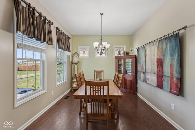 1387 Mayfield Ct, Westfield, IN 46074 - dining space with a chandelier and dark wood-style flooring