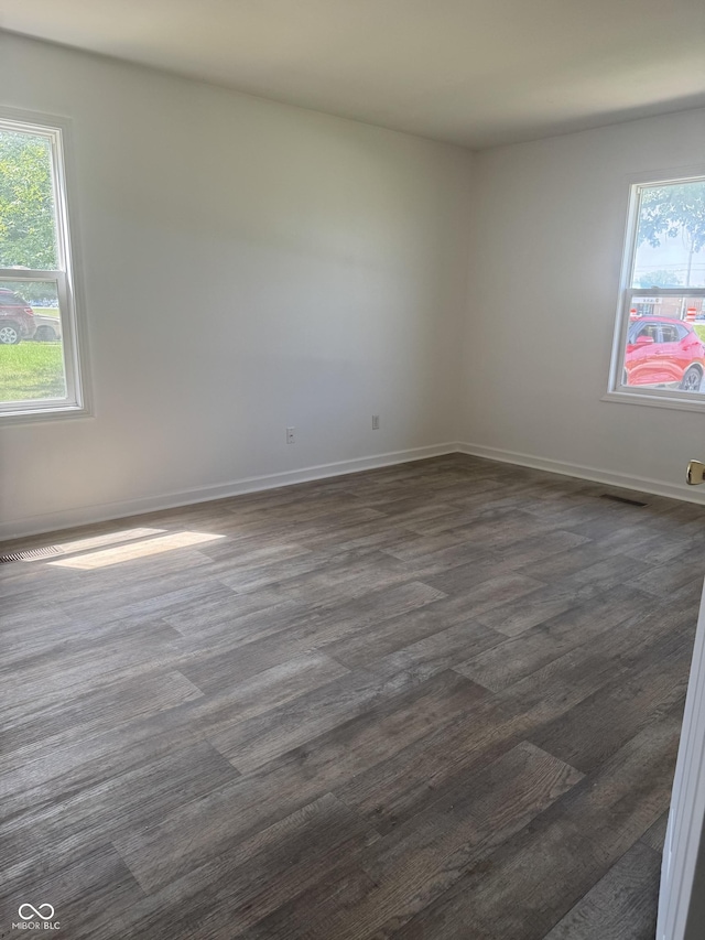 1831 N Main St, Franklin, IN 46131 - unfurnished room featuring baseboards and dark wood-style floors