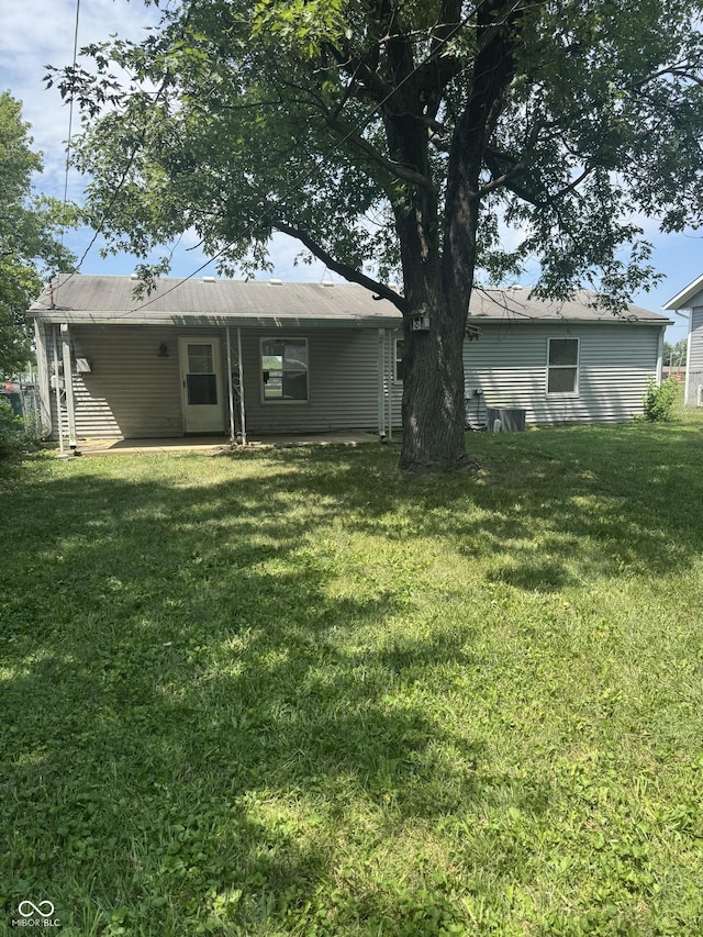 1831 N Main St, Franklin, IN 46131 - back of house featuring a lawn