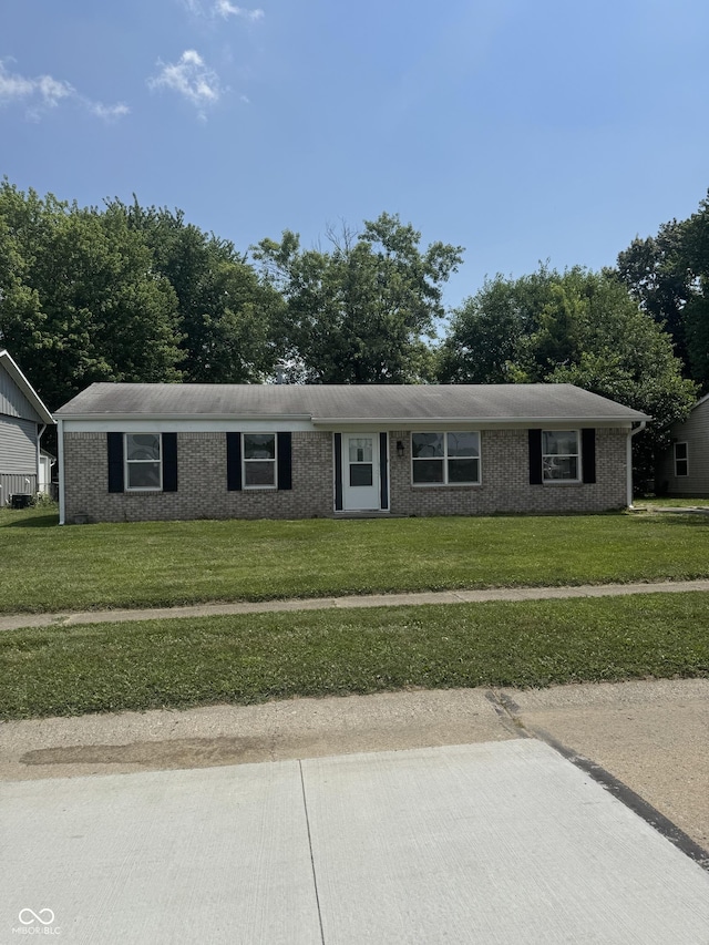 1831 N Main St, Franklin, IN 46131 - ranch-style house with a front lawn and brick siding