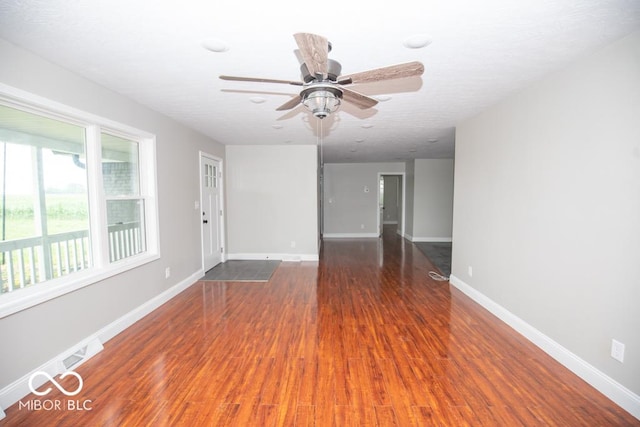 7950 N 475 E, Columbus, IN 47203 - unfurnished room with wood finished floors and ceiling fan